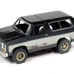 Auto World 1977 Chevrolet Blazer (Black/White) X-Traction R1 HO Slot Car